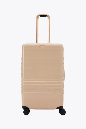 The Medium Check-In Roller in Glossy Beige